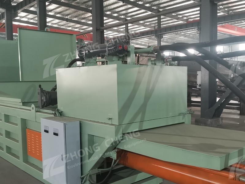 Horizontal garbage baler