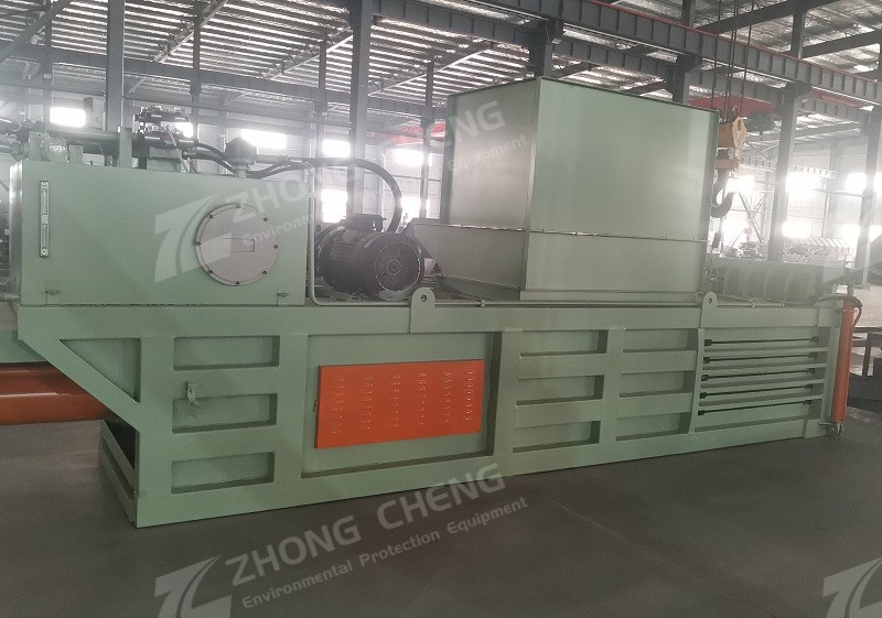 Horizontal garbage baler